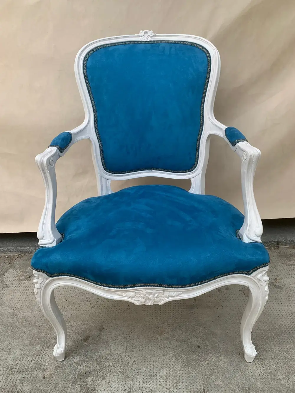 Poltrona turchese rivestita